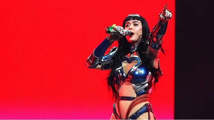 Katy Perry on stage in Detroit inviting young fans up to perform