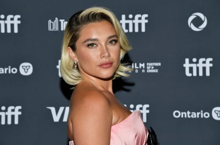 Florence Pugh portrait headshot smiling at event