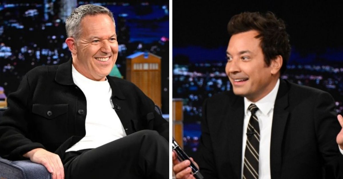 Greg Gutfeld and Jimmy Fallon hugging on The Tonight Show stage
