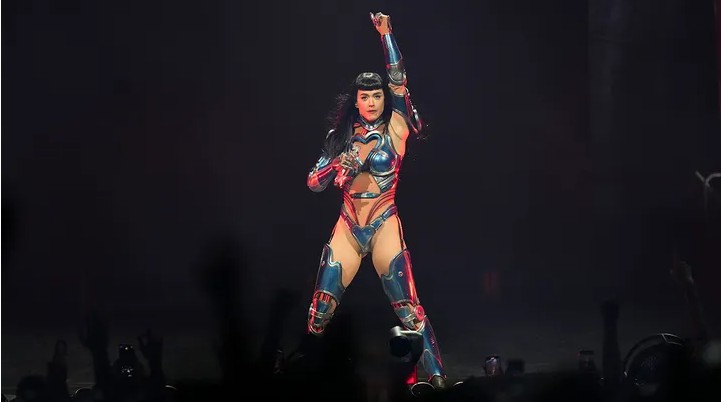 Katy Perry on stage in Detroit inviting young fans up to perform